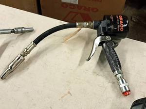 lot 168 image: Graco 1500-PSI Metered Dispenser Valve with Flex Line