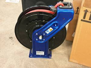 lot 188 image: Graco 300-PSI Hose Reel with Hose #HPL65B (in original packaging)