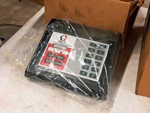 lot 229 image: Graco Electronic Fluid Commander Dispensing Control Box with Power Cord (in original packaging)