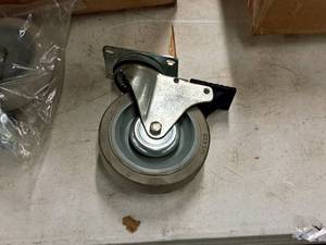 lot 399 image: Lot of (4) 5 Swivel Caster Wheels with Locking 516 Top Plate (in original packaging)