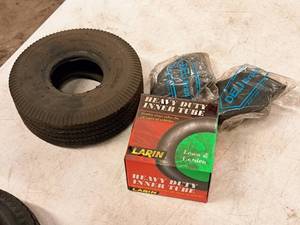 lot 404 image: (1) 10 Tire, (2) Butyl Inner Tubes Size 4.103.50, (1) Larin Heavy Duty Inner Tube Size 4.103.50-4 (in original packaging)
