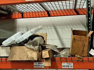 lot 425 image: Lot of (Shelf Contents) Misc. Replacement Parts, Casters, Oil Drains. Parts Organizer Cases,  Hoses (in original packaging)