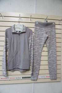 lot 92 image: Under Armor Athletic Outfit (Size Small)