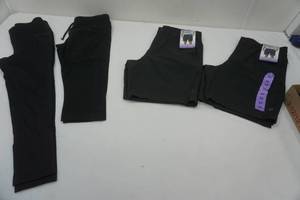 lot 165 image: (2) Tech Short Size 30 New With Tags, Leggings, and Capris (all black color)