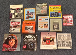 lot 469 image: Variety of Great Books on Cameras including McBrooms Camera Blue Book, Pictures of the Times and More
