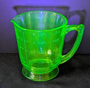 lot 82 image: Large Vintage Uranium Glass Measuring Cup