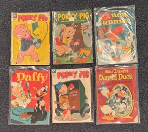 lot 585 image: Vintage Porky Pig, Donald Duck, New Funnies and Daffy Duck Comic Books