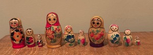lot 586 image: Three Sets of Vintage Nesting Dolls