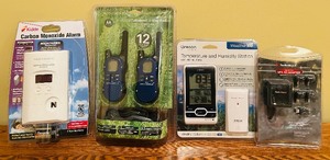 lot 610 image: New Packaged Items Including, Carbon Monoxide Alarm, 2 Way Radio, Temperature and Humidity Station, GPS AC Adapter