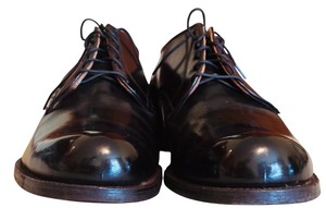 lot 719 image: OSullivans Black Wingtip Shoes