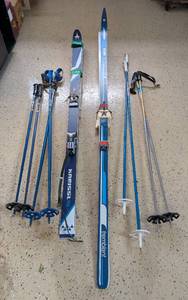 lot 659 image: Set of Trek Kneissl XL Cross Country Skis with Poles and Set of Tremblant Skis with Poles