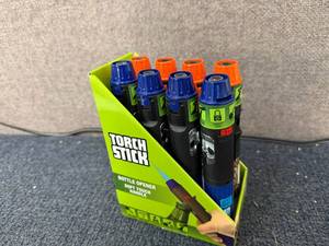 lot 24 image: 8 Pack of Torch Sticks With Bottle Opener