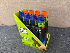 lot 26 image: 8 Pack of Torch Sticks With Bottle Opener