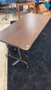 lot 32 image: Used Folding Table with Woodgrain Finish