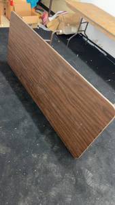 lot 33 image: Used Folding Table with Wood Grain Laminate Surface