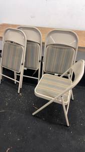 lot 87 image: Set of 4 Beige Folding Chairs with Striped Cushions