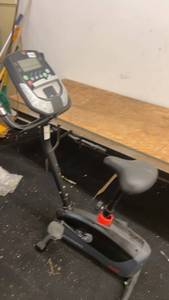 lot 100 image: Used Upright Exercise Bike with Digital Monitor