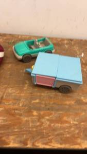 lot 127 image: Vintage Barbie Dollhouse with Accessories and Toy Vehicles