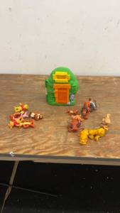 lot 173 image: Vintage Winnie the Pooh and Lion King Playset with Figurines