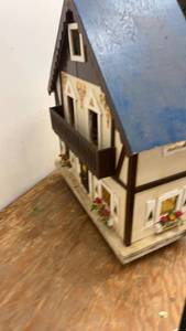 lot 214 image: Vintage Wooden Dollhouse with Charming Detailing