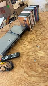 lot 229 image: Magnavox DVD Player with Remote and 15 Assorted DVDs