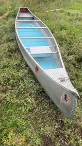 lot 253 image: Osagian Aluminum Canoe with Indian Logo, Model 24