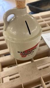 lot 274 image: Red Wing Shoe Co. Ceramic Jug Bank with Cork Stopper