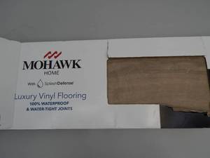 lot 7 image: Mohawk Luxury Vinyl Flooring - Color Tudor Oak