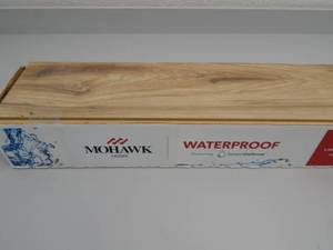 lot 12 image: Mohawk Luxury Vinyl Flooring - Color Millport Hickory Oak