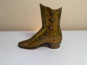 lot 24 image: Womens Brass Boot Doorstop