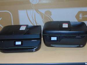 lot 9 image: 2 Officejet 4650 and 3830 Printers power up
