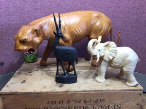 lot 249 image: Vintage Leather Lioness - Carved Antelope & Resin Elephant