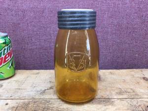 lot 301 image: Ball Bros The Amber Buffalo Jar 1976 Reproduction of 1885 Jar