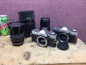 lot 129 image: 2 Minolta XG1 Cameras Plus Lenses - Vivtar Series 1
