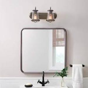 lot 64 image: Home Decorators Collection Georgina 18 in. 2-Light Weathered Iron Industrial Rustic Vanity with Clear Seeded Glass Shades and Cage Accents  Customer Returns See Pictures