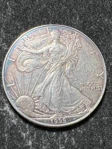 lot 15 image: 1999 AMERICAN SILVER EAGLE 1 TROY OZ .999 FINE SILVER
