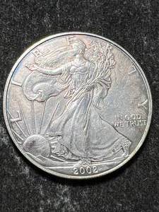 lot 29 image: 2002 AMERICAN SILVER EAGLE 1 TROY OZ .999 FINE SILVER