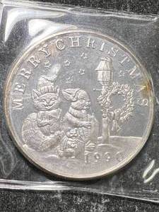 lot 40 image: 1 TROY OZ .999 FINE SILVER 1990 MERRY CHRISTMAS ROUND