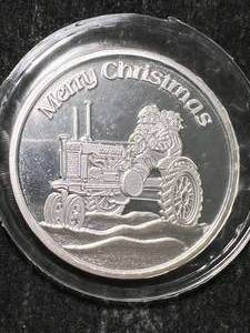 lot 63 image: 1 TROY OZ .999 FINE SILVER MERRY CHRISTMAS ROUND