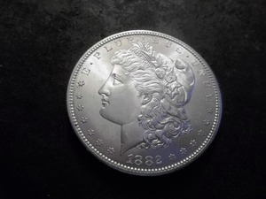 lot 21 image: 1882 S Morgan Silver Dollar