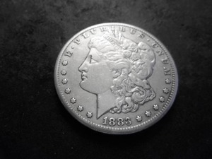 lot 23 image: 1883 CC Morgan Silver Dollar
