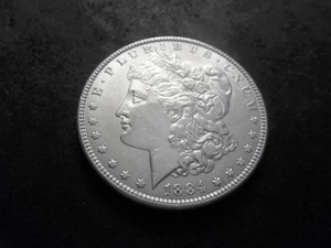 lot 26 image: 1884 Morgan Silver Dollar