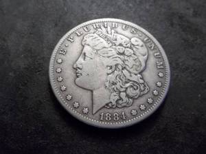 lot 29 image: 1884 S Morgan Silver Dollar