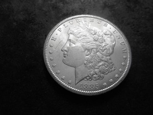 lot 31 image: 1885 CC Morgan Silver Dollar