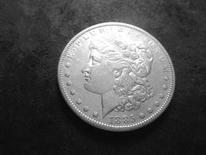lot 33 image: 1885 S Morgan Silver Dollar