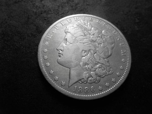 lot 35 image: 1886 O Morgan Silver Dollar