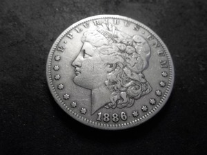 lot 36 image: 1886 S Morgan Silver Dollar
