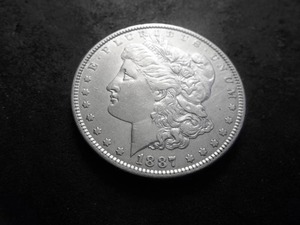 lot 37 image: 1887 Morgan Silver Dollar