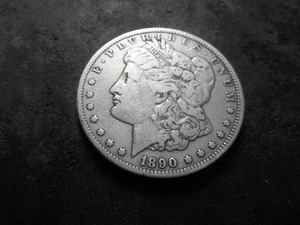 lot 48 image: 1890 CC Morgan Silver Dollar