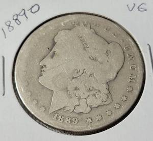 lot 8 image: 1889 -O Morgan Silver Dollar - VG